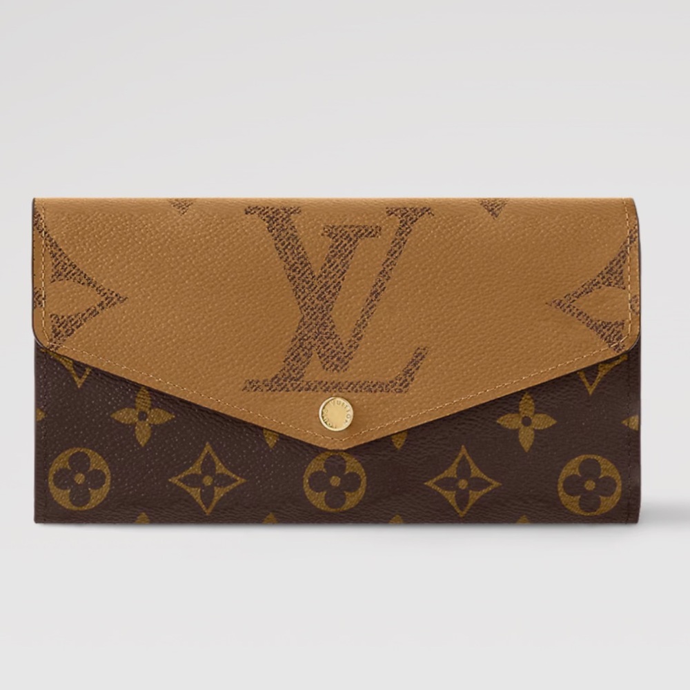 Brand new full set Louis Vuitton reverse monogram Sarah wallet